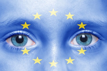 child's face with european union flag
