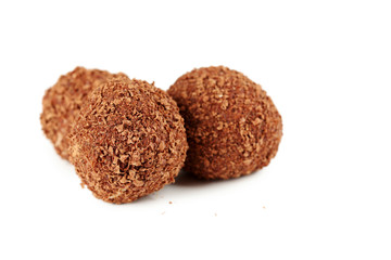 Sweet chocolate truffle isolated on a white