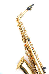 Golden saxophone isolated on white background, close up