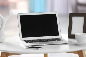 Comfortable workplace at home with laptop