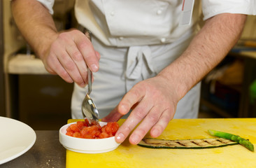 Chef is making vegetable appetizer