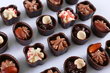 Delicious chocolate candies background, close up