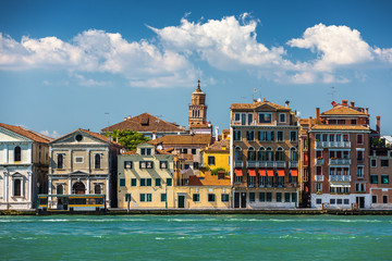 A leaning bell tower in Venice, Italy