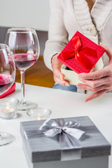 Woman opening the present