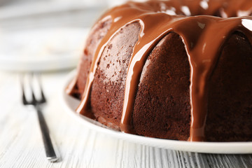 Round cake on plate closeup