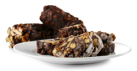 Chocolate salami in a plate, isolated on white