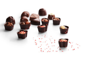 Assorted chocolate candies, isolated on white