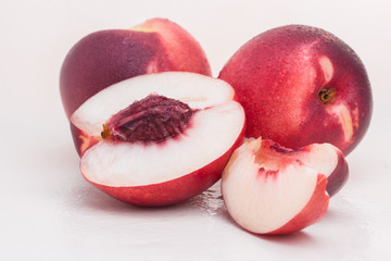 Peach. Fruit with slice isolated on white background