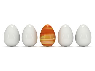 Easter egg in a row of the white eggs