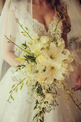 Bride holding wedding bunch
