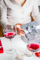 Woman opening a gift