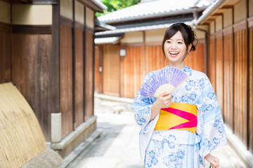 young asian woman wearing kimono