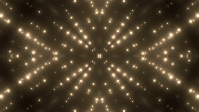 Fractal Golden kaleidoscopic background with brilliant particles. Disco spectrum lights concert spot bulb.