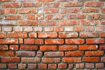 Old brick wall half weathered