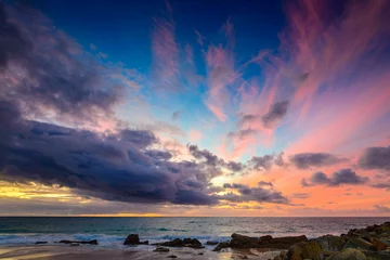 Photo sur Aluminium Mer / coucher de soleil Dramatic clouds and sunset