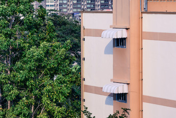 Rainproof awning of slide window on sunny day. © Eakkaluk