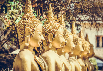 Golden buddha Statue in Vientiane, Laos. Generally in Laos, any kinds of decorated in Buddhist church, etc. they are public domain of Buddhism