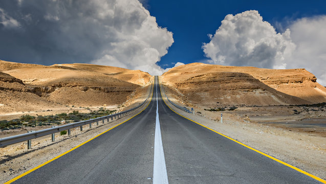 Desert road before thunderstorm