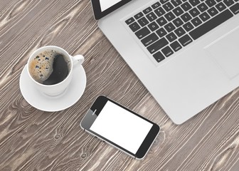 Laptop smartphone and coffee cup 