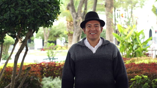Portrait shot of an indigenous Saraguro man wearing traditional hat in the province of Loja and the country of Ecuador.