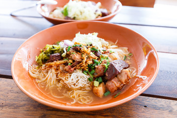 Noodle with spicy pork sup