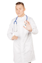 Young  male doctor in white coat and stethoscope making stop sig