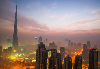 Downtown Dubai covered by early morning fog