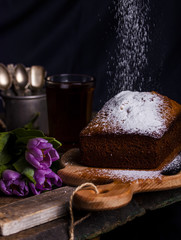 cake with honey, coconut and spices on wooden background