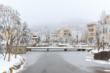 Da Shan Bao, China - February 2, 2016: City center covered with snow in Da Shan Bao Yunnan