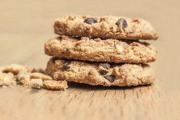 Close up image of delicious cookies on brown background.