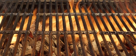 Empty BBQ Fire Grill And Burning Charcoal With Bright Flames.