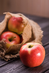 Red apple near bag