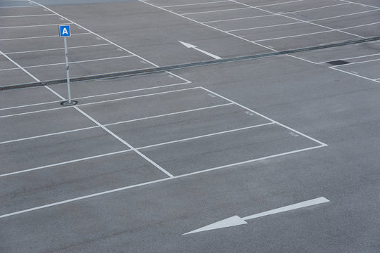 Car park with empty parking lots