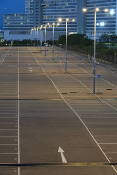empty car park with city background