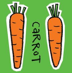 Carrots on green background