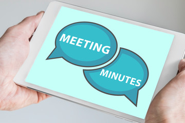 Meeting minutes concept with hands holding modern tablet or smartphone to be used as slide background