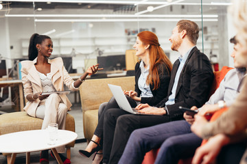 Business people conversation. Technology at hand