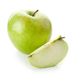 Green apple with slice on white background