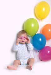 Fototapeta na wymiar baby with balloons