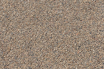 Texture of brown pea gravel rock, street background, Tokyo, japan.