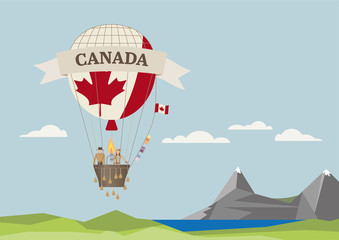 Fototapeta na wymiar Air Balloon with Canadian flag and people