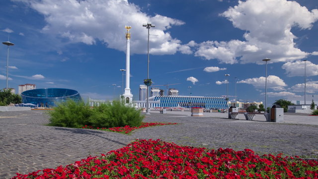 Stele monument Kazakh Eli with bird Samruk and Palace of Independence timelapse hyperlapse.