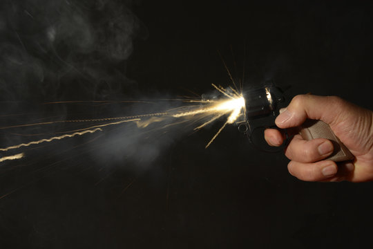 Hand Gun Being Fired