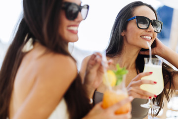 Gorgeus ladies drinking cocktails