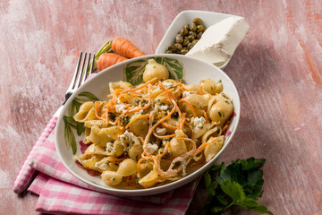 pasta with carrot capers and soft cheese