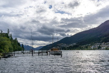 lake wakatipu and a small dock