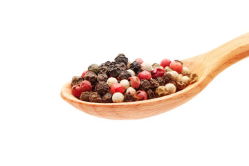 Spice in spoon on white background