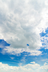 white fluffy clouds in the blue sky