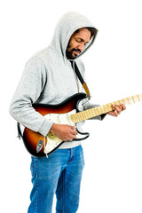 Naklejka premium Man is playing electric guitar. Isolated on white