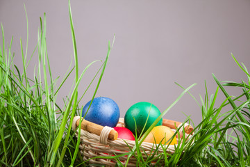 Easter basket with colored eggs